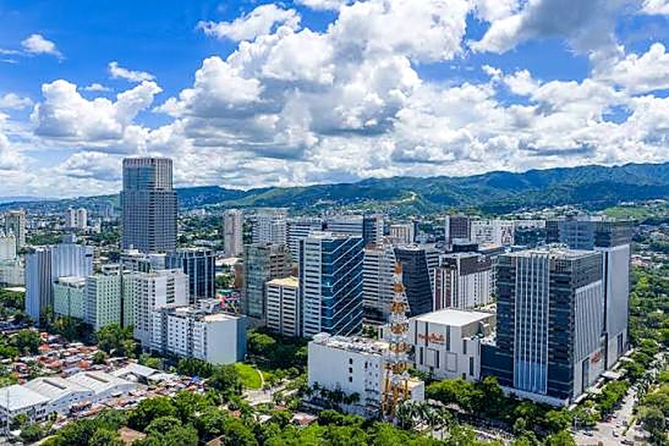 Daytime aerial view of Cebu City and surrounding mountains