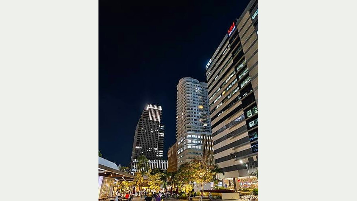 Street-level view of a Cebu business district at night