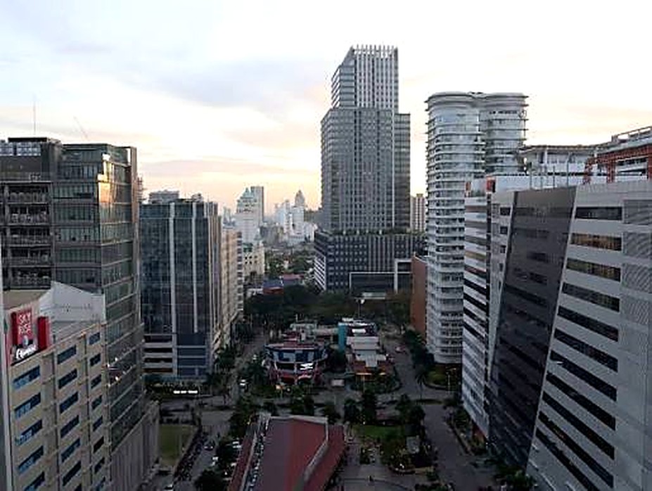 Cebu City business district skyline viewed along a central street