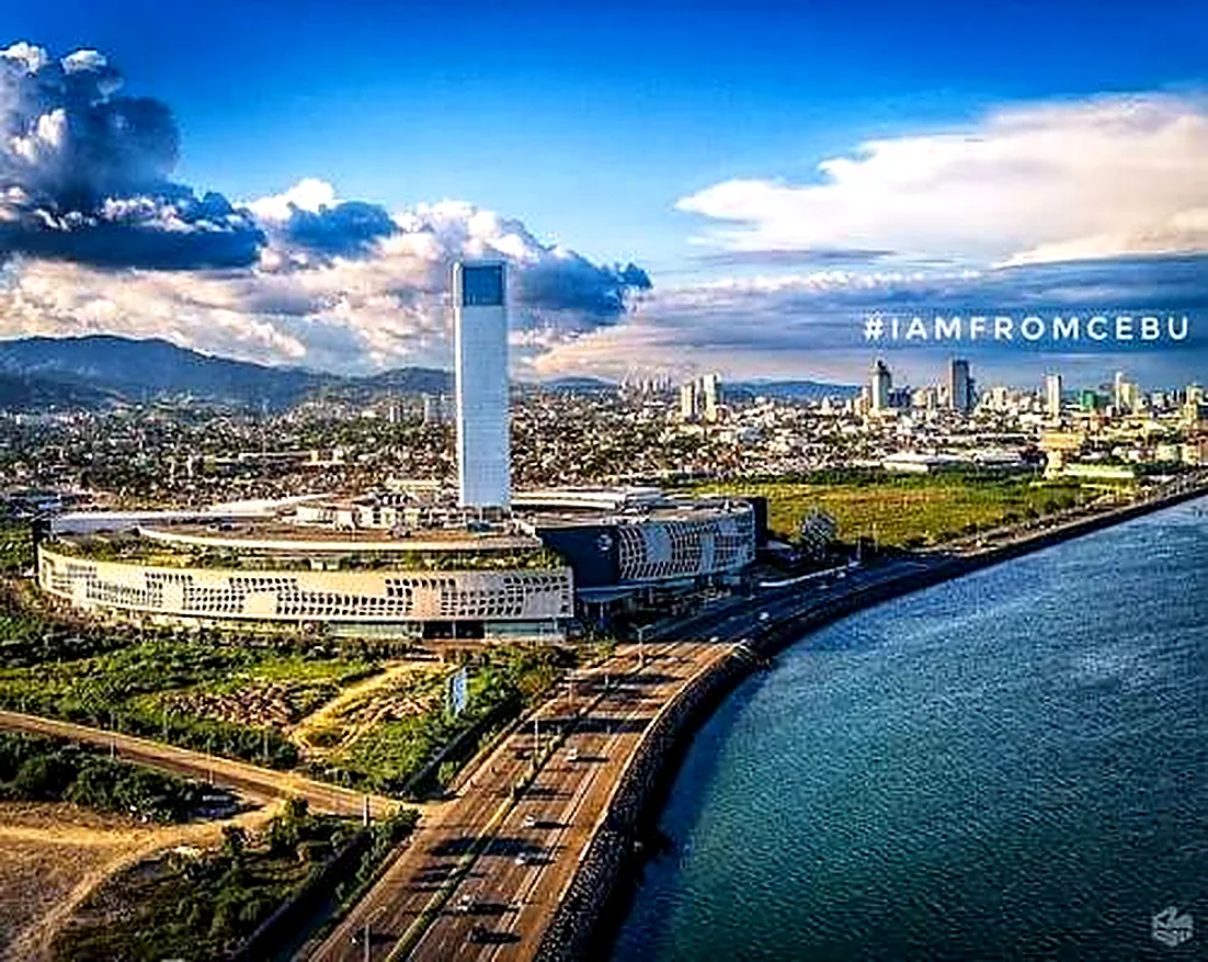 Refined waterfront Cebu city skyline background